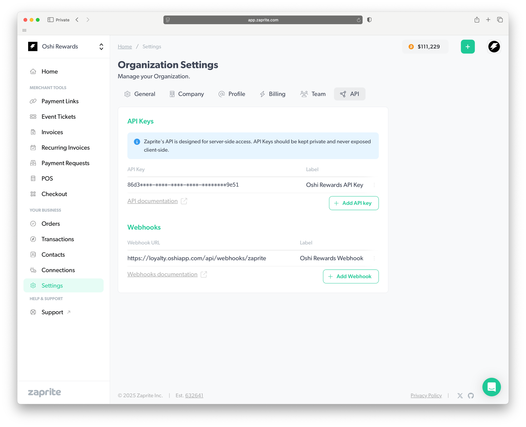 Screenshot of the Zaprite dashboard showing the API Keys section under Organization Settings, where merchants can create and copy a new API Key, and view or add webhooks.